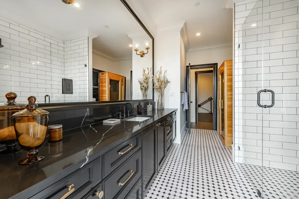 bathroom with black and white tile