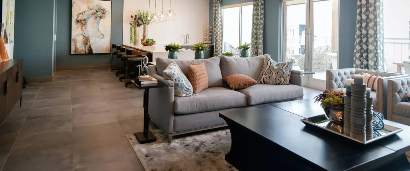 black-wooden-coffee-table-near-white-couch